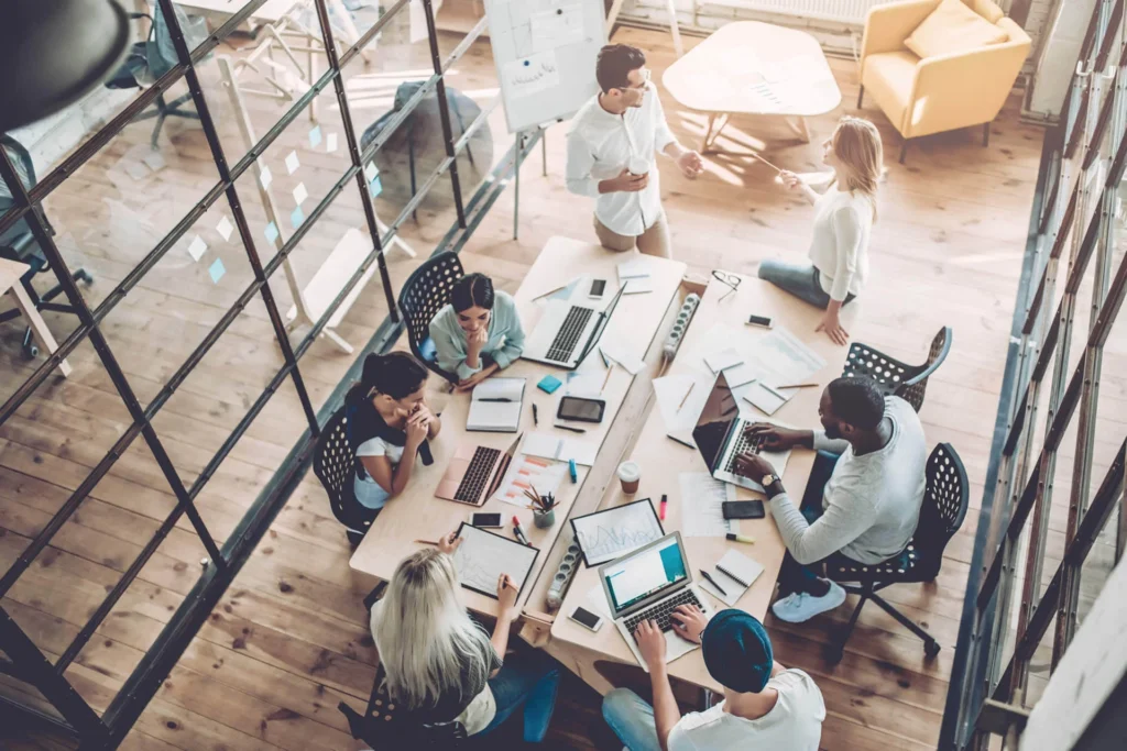 Aerial view of Sure Group team hard in their office hard at work.
